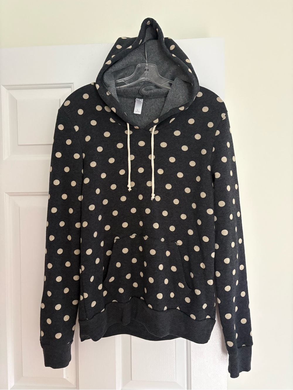 Women’s Black Polka Dot Hooded Pullover Sweatshirt (size L)